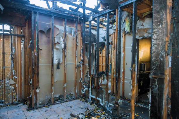 Professional Fire Damage Restoration technician working in Dellwood, MO